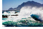 Image: ocean waves crashing on rocks