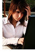 Image: female student with a laptop computer